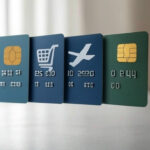 : 5 floating credit cards with icons showing cashback, shopping, flights, and zero fees